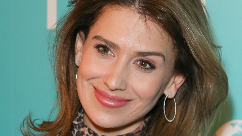 Hilaria Baldwin smiles with her hair down