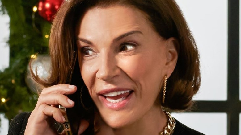 Hilary Farr talking on phone in "Designing Christmas"