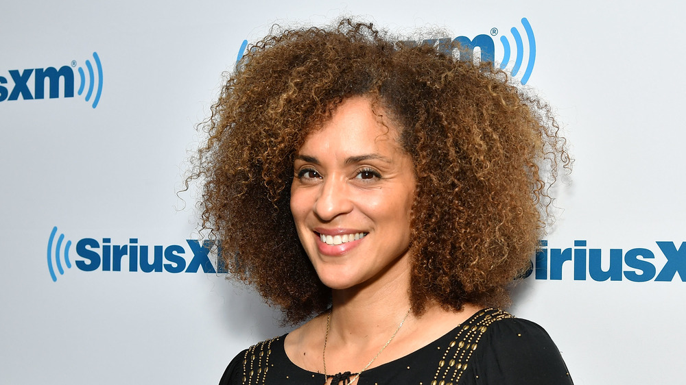 Karyn Parsons smiling at event