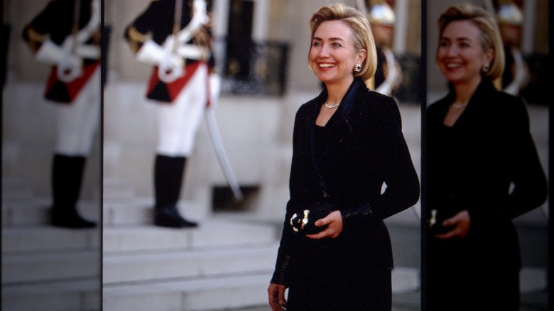 Hillary Clinton smiles as she arrives in Paris (1994)