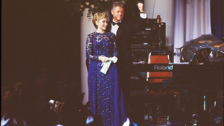 Bill and Hillary Clinton stand on stage January 20, 1993 in Washington, DC. Eleven inaugural balls were held on the same evening in honor of President Clinton's election (1993)