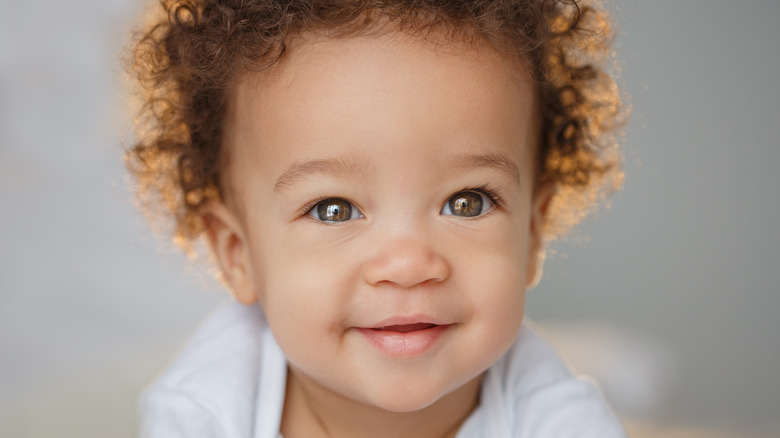 baby looking past camera