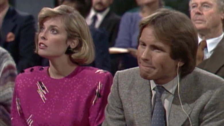 John Ritter and Mary Therese Cadorette in a scene from "Three's a Crowd"