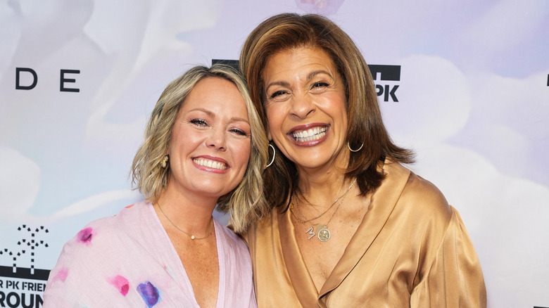 Dylan Dreyer and Hoda Kotb smile together on the red carpet