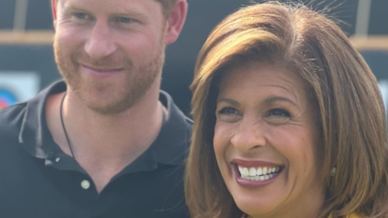 Hoda Kotb posing with Prince Harry 