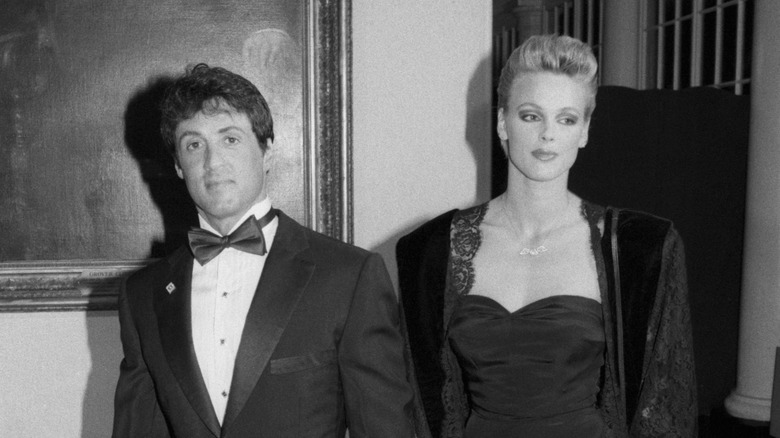 Sylvester Stallone and Brigitte Nielsen walking