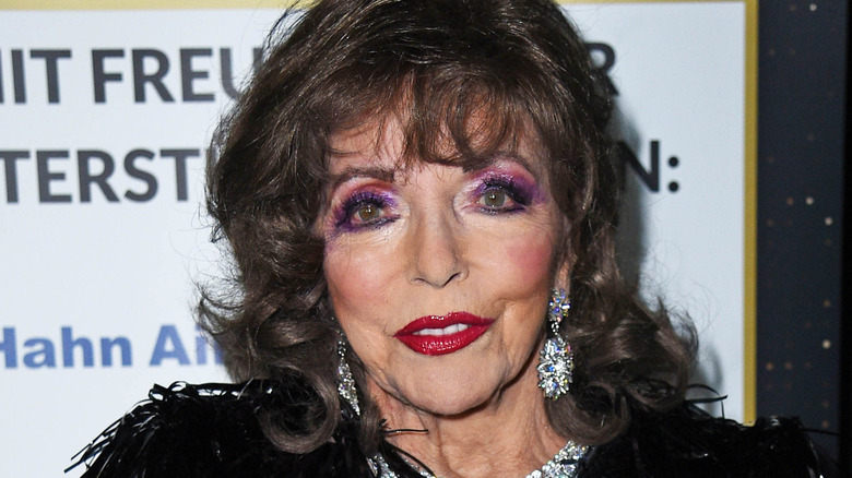 Joan Collins smiling