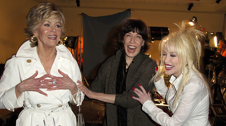 Lily Tomlin, Jane Fonda, and Dolly Parton laughing together