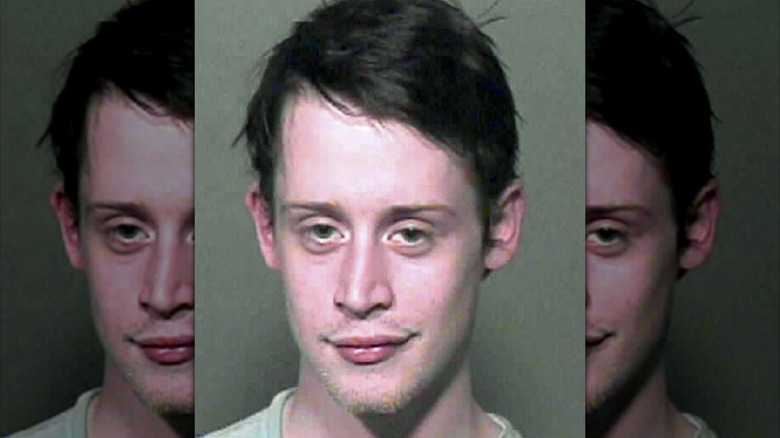 Macaulay Culkin smirking