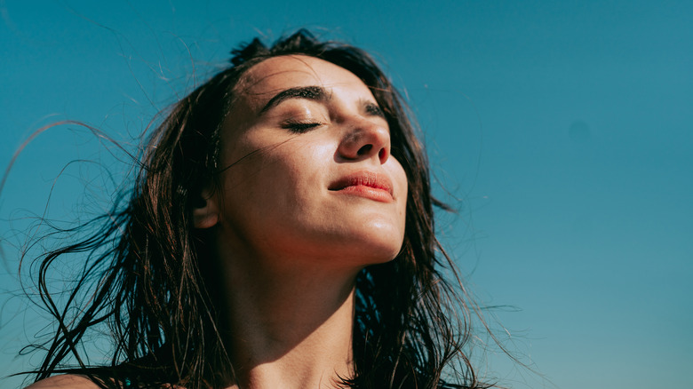 Happy woman on the beach