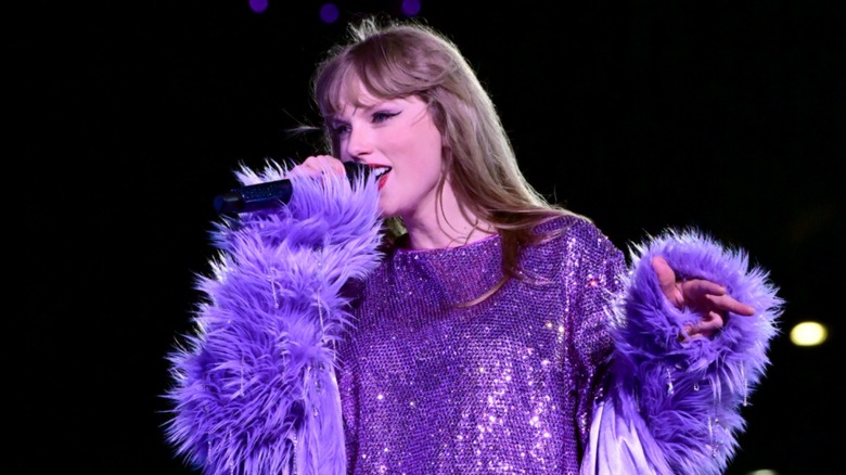 Taylor Swift performing "Lavender Haze" onstage