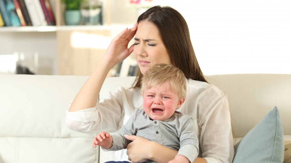 mom with baby crying