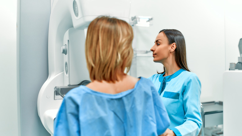 Woman getting mammogram