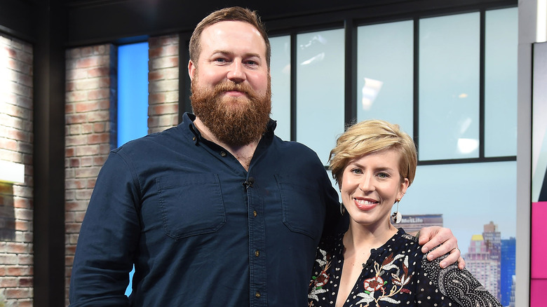 Erin and Ben Napier smile in studio