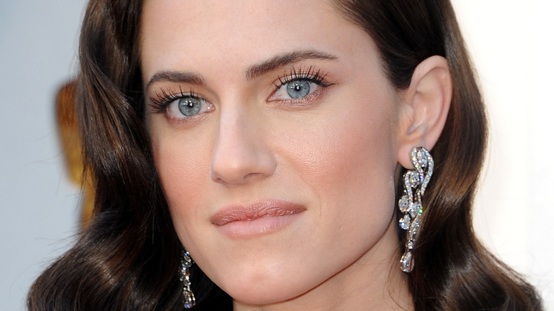 allison williams wearing sparkly earrings