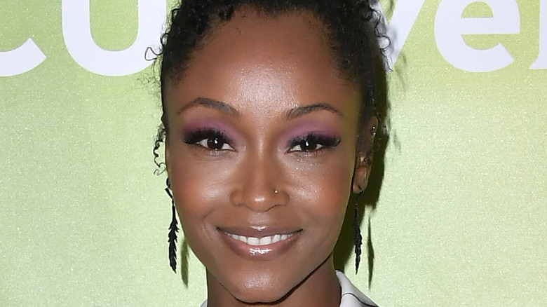 Yaya DaCosta poses on the red carpet