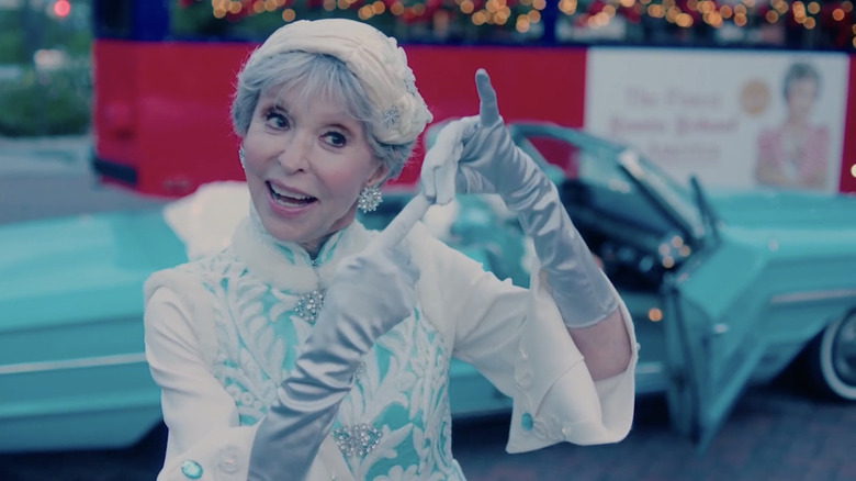 Rita Moreno signing in "Santa Bootcamp"