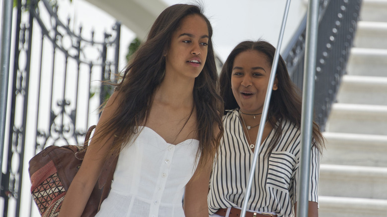 Malia and Sasha Obama smiling