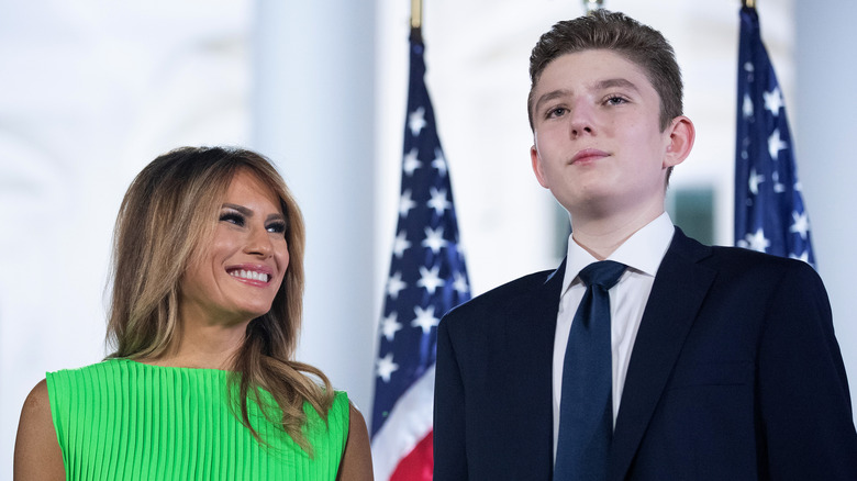 Melania Trump and son Barron Trump standing together