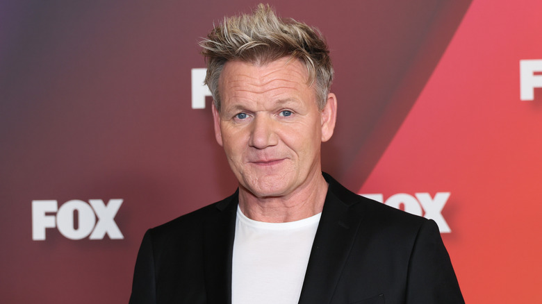 Gordon Ramsay posing in front of a Fox backdrop