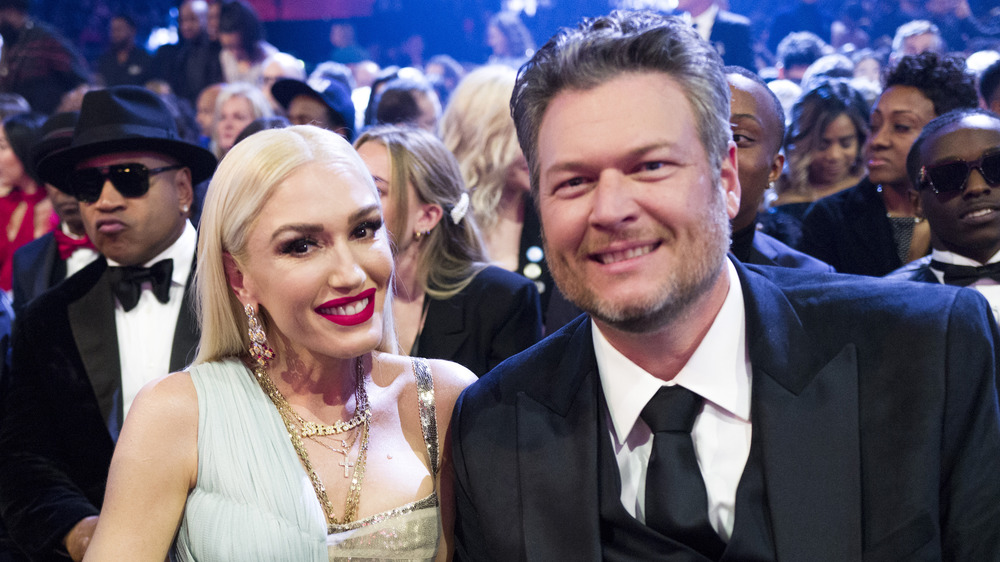 Blake Shelton and Gwen Stefani smiling 