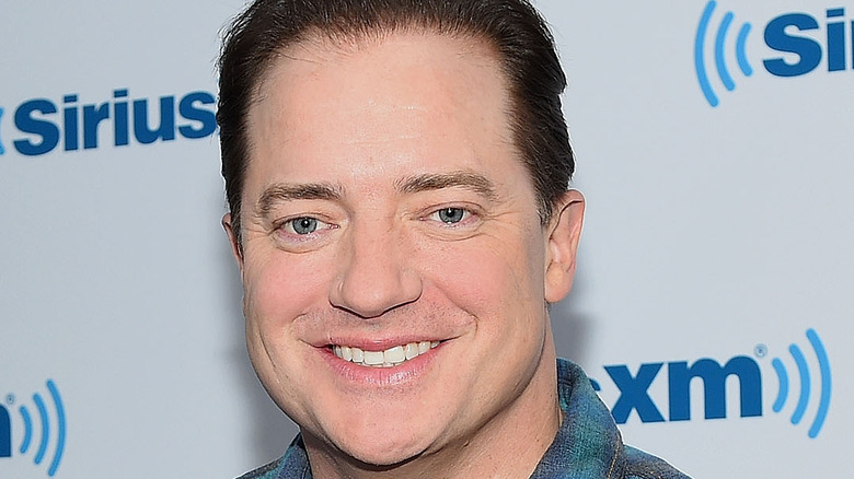 Brendan Fraser smiling on the red carpet