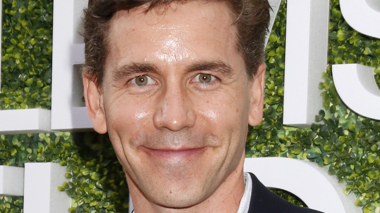 Brian Dietzen smiles on the red carpet