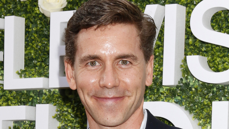 Brian Dietzen smiles on the red carpet