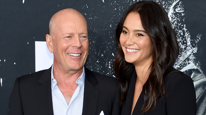 Bruce Willis and Emma Heming smiling