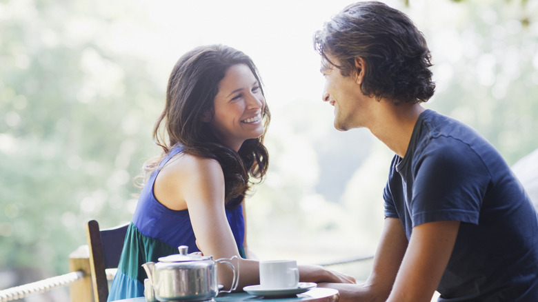 couple smile at each other 