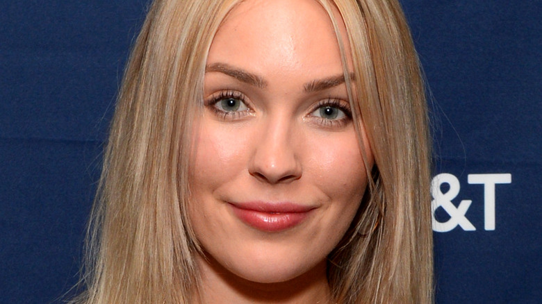 Cassie Randolph poses on the red carpet