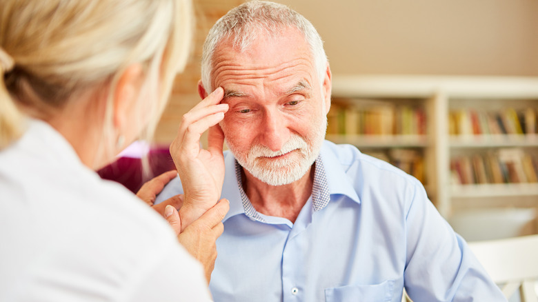 doctor caring for Alzheimer's patient