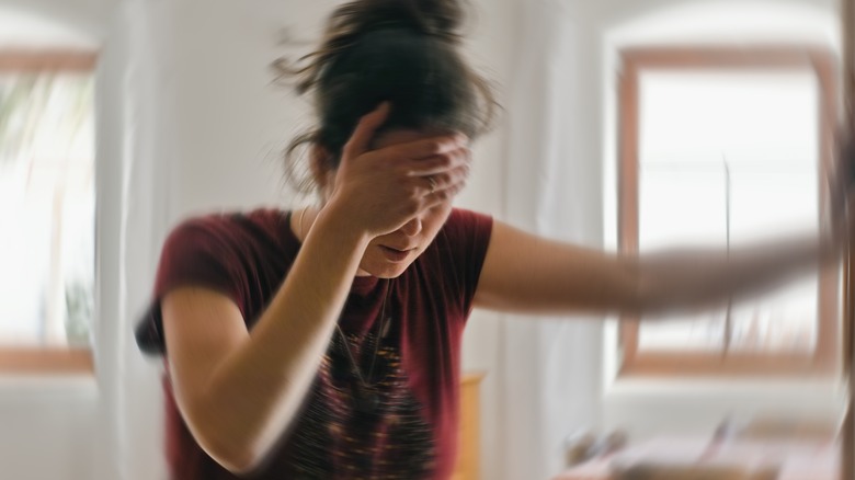 Woman suffering from a migraine 