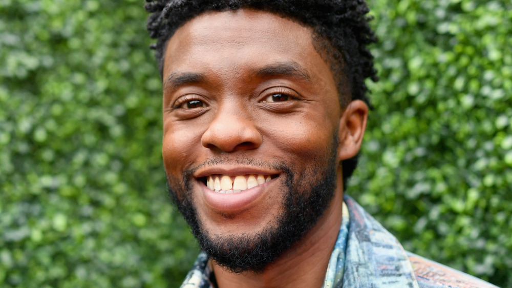 Chadwick Boseman smiles