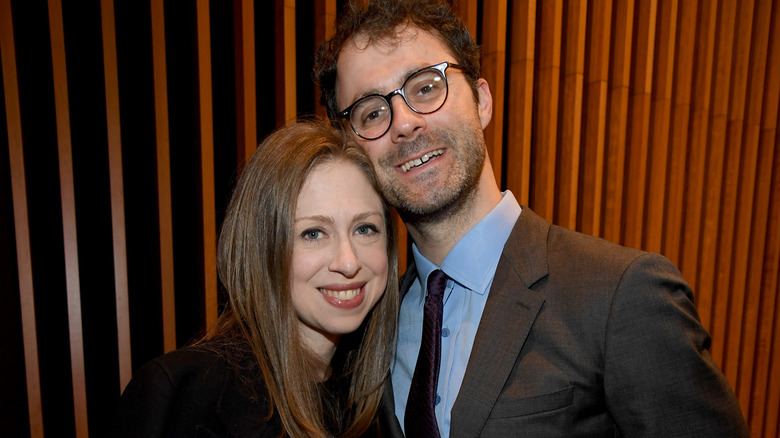 Chelsea Clinton and her husband