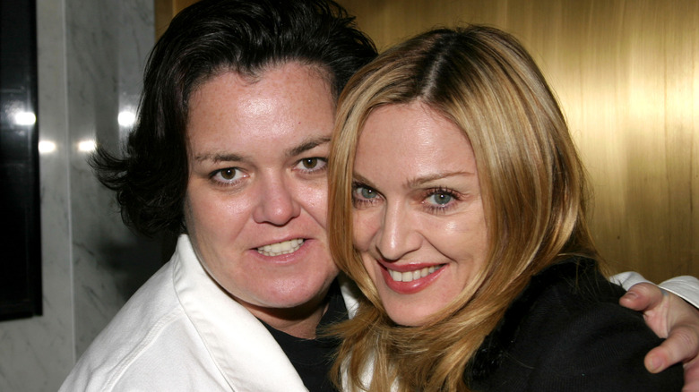 Rosie O'Donnell embracing Madonna