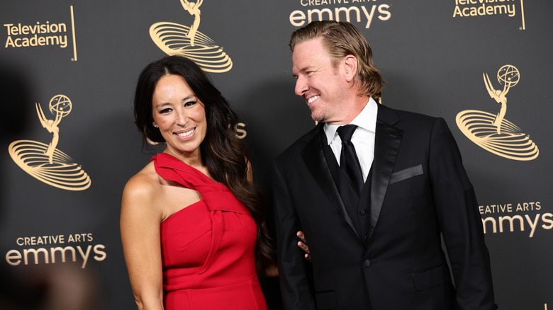 Chip and Joanna Gaines posing together in formal attire
