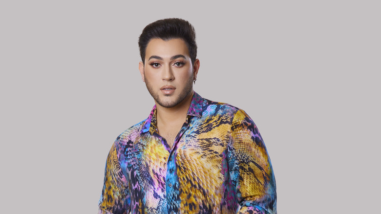 Manny MUA posing
