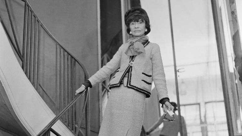 Coco Chanel on stairs