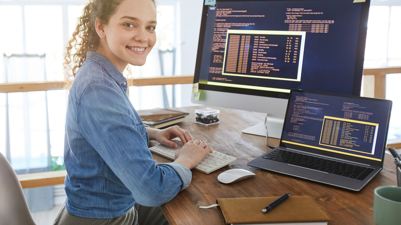 Woman in casual clothes in office