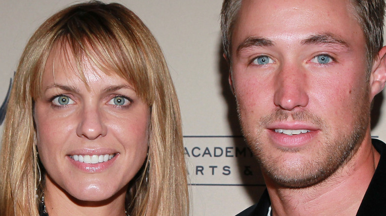 Arianne Zucker and Kyle Lowder posing