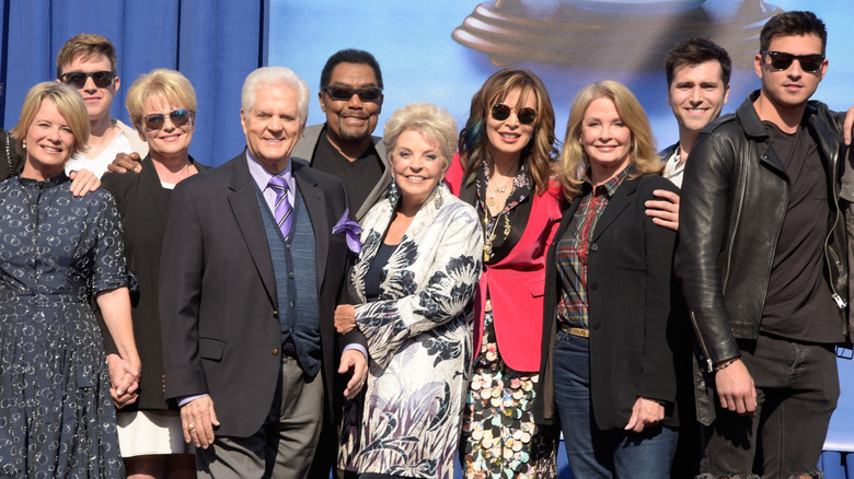 The cast of Days of Our Lives pose for a photo. 