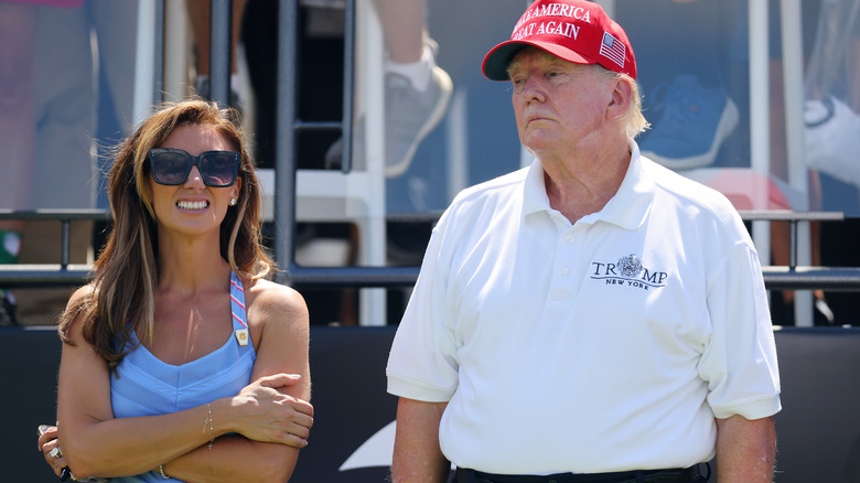 Donald Trump and Alina Habba standing next to each other