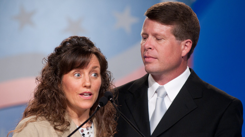 Michelle and Jim Bob Duggar speak at an event