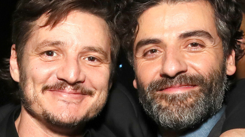 Oscar Isaac and Pedro Pascal smiling