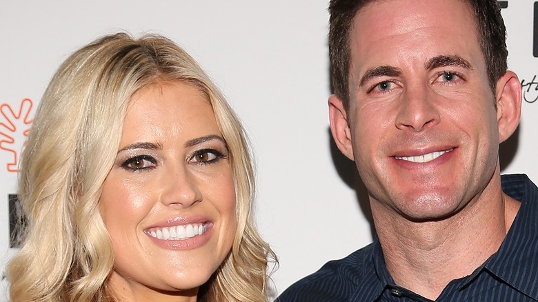 Tarek El Moussa and Christina Hall pose