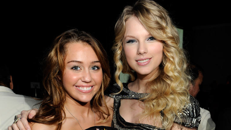 Taylor Swift and Miley Cyrus smiling