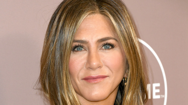 Jennifer Aniston poses at an event.