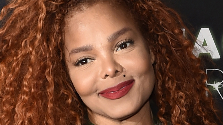 Janet Jackson smiling on the red carpet