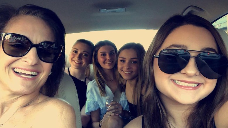 Mary Lou Retton with daughters in car